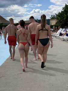 Hot Young Milf in a Red Swimsuit Walking by the Pool With Her Friend, Creepshots of Her Sexy Booty