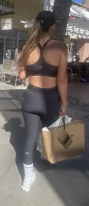 Latina in spandex shorts + other girls