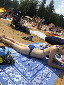 Pale Skinny Girl in a Blue Swimsuit Lying on a Beach Creepshots Collection