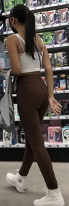 Slim latina in light brown leggings