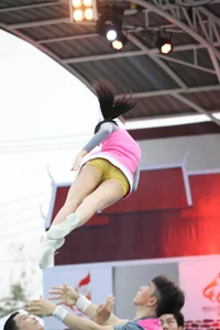 Bunch of athletic Thai cheerleaders at a competition