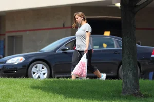 Thick girl out walking in black leggings