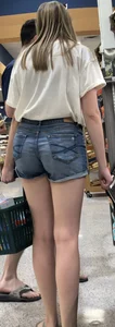 Blondie in jean shorts at the market