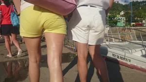 Milf in yellow shorts with vpl and a wedgie