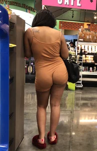 Latina with hard nipples and a big booty in tight spandex shorts outfit