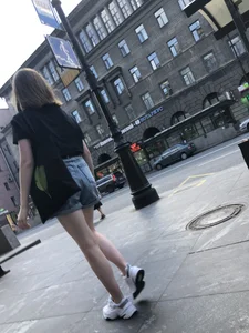 Candid Teen in Denim Shorts And Sneakers With Slim Legs Street Photos
