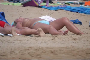 Girls on a nude beach in Bibione, Italy
