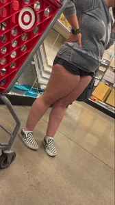 Almost busted by target security for this meaty mom showing cheeks