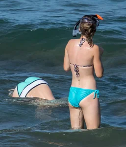 Another sexy girl on the beach snorkeling