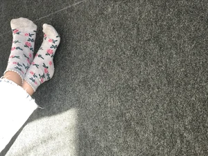 Girl's Feet in Cute Socks Closeup Creepshot