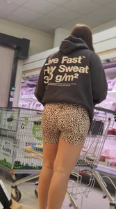 Thick brunette in short leggings and company