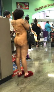 Latina with hard nipples and a big booty in tight spandex shorts outfit