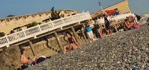 Hot Candid Girl in a Swimsuit Chilling on a Beach With Her Boyfriend Creepshots Series