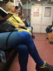 Girl in Blue Spandex Tights Reading in the Subway Train Candid