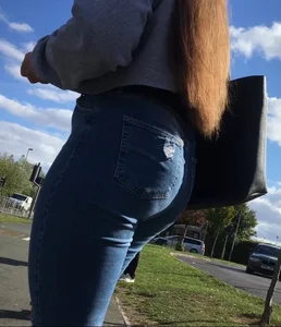 Long haired beauty teen with a tight ass in jeans