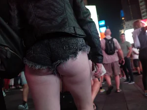 Girl in NYC showing her ass cheeks in denim shorts