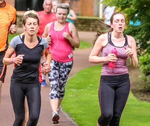 Candid track girls and runners