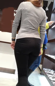 Big booty employee in tight black jeans with slight vpl