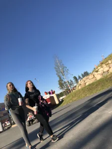 Skinny Girl in Grey Leggings Walking Past the Camera Candid Photos Gallery