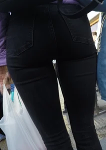 Juicy ass in black tight jeans and nice skinny legs street closeups