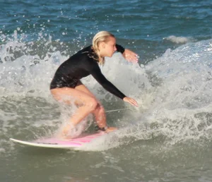 Hot surfer chicks out in the water
