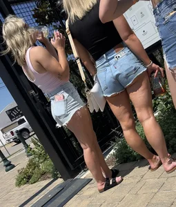 Blonde in cut offs with friends