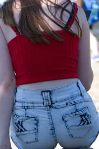 Pretty candid girls with nice legs sitting in denim shorts