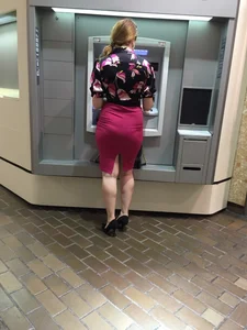 Milf on High Heels in a Skirt Using ATM Candid Pic