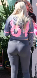 Thick blonde out in grey leggings with a nice ass