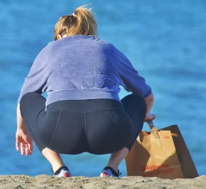 Beach blonde in leggings with a decent booty