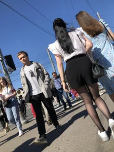 Skinny candid teen wearing shorts and black pantyhose crossing the street
