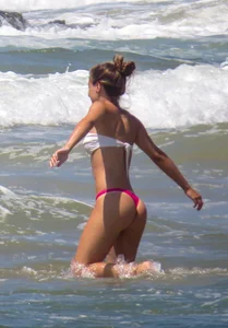 4 sexy ass girls in thong bikinis at the beach