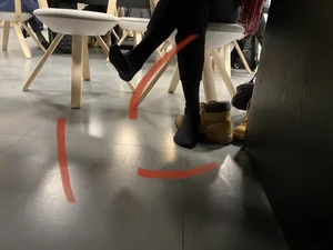 Crossed Legs in Black Pantyhose And Feet With Boots Taken Off - Office Under Table Creepshots