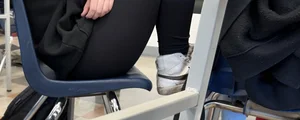 College teen in leggings sitting at her desk in class creepshots