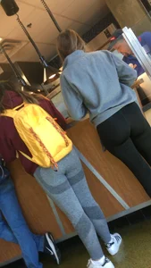 Girl in Yoga Pants in a Cafe Candid Photo
