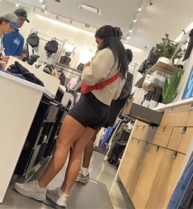 Sexy LuLu Lemon employee in tight black biker shorts