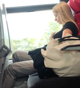 Hot busty blonde on train