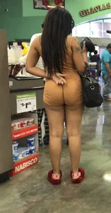 Latina with hard nipples and a big booty in tight spandex shorts outfit