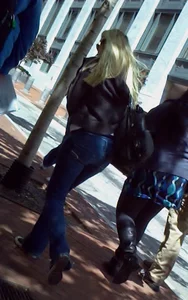 Blonde in tight jeans with her red thong sticking out