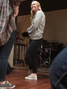 A hot blonde with beautiful smile and nice ass in leggings