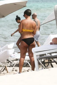 Frankie Bridge nip slips in a bikini on the beach