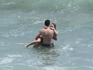 Hilary Duff in purple bikini in Malibu with a great ass and hard nipples
