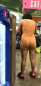 Latina with hard nipples and a big booty in tight spandex shorts outfit