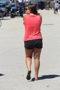 Thick girl in pink top and black shorts with vpl