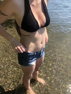Someones girlfriend with nice tits in black bikini top and shorts