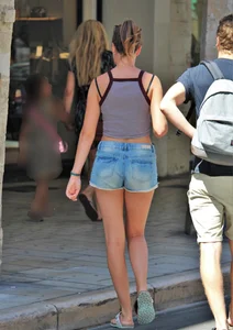 Beautiful teen out with boyfriend in short jean shorts