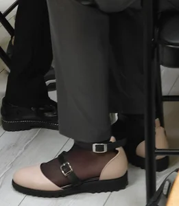 Closeups of a Candid College Teen's Feet in Black Pantyhose And Boots, Sitting in Class