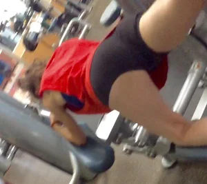 Skinny Girl in Mini-Shorts Working out in a Gym Hot Creepshot