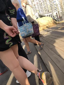 Cute blonde candid teen crossing the street