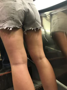 Hot Legs and Ass in Denim Fringe Shorts Escalator Closeup Creepshots